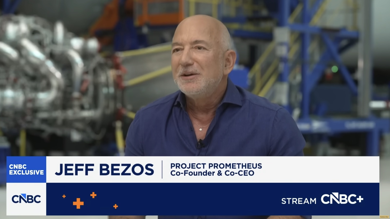 Jeff Bezos on camera during the May 20, 2026 CNBC interview, with the on-screen chyron identifying him as 'Project Prometheus, Co-Founder & Co-CEO,' confirming his operational role at the $6.2 billion AI startup he previously had only briefly mentioned.