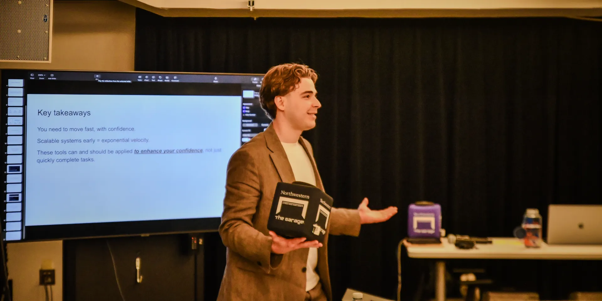 Michael Pavlovskyi speaking at Northwestern University's The Garage on practical AI adoption for professional services firms