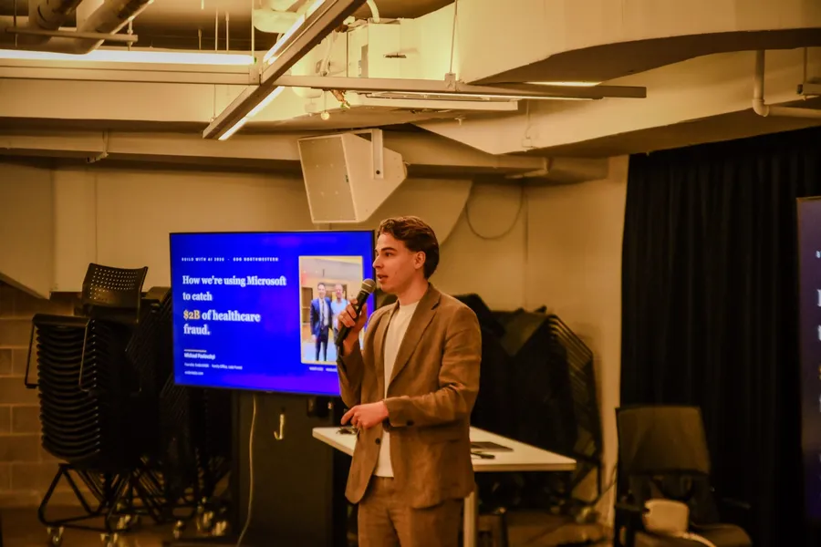 Michael Pavlovskyi training a team on AI